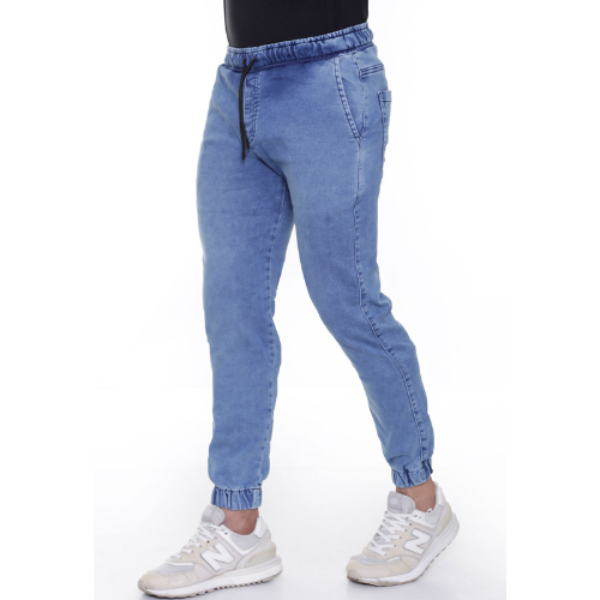 Light blue jeans worn by a person on a white background